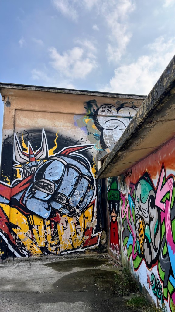 Mountain bikers preparing to ride at the NATO Base trailhead in Finale Ligure, Italy